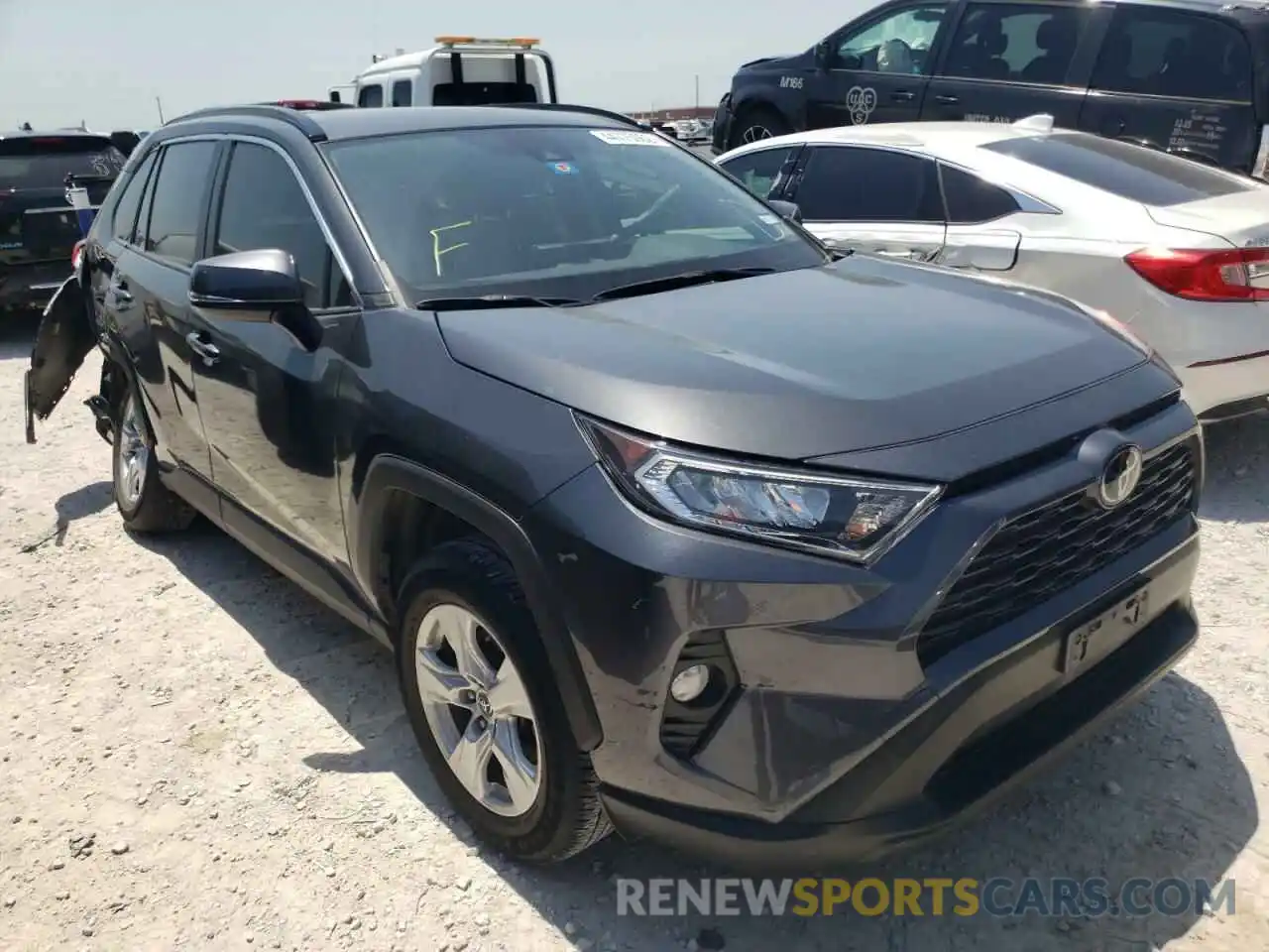 1 Photograph of a damaged car JTMW1RFVXKD008326 TOYOTA RAV4 2019