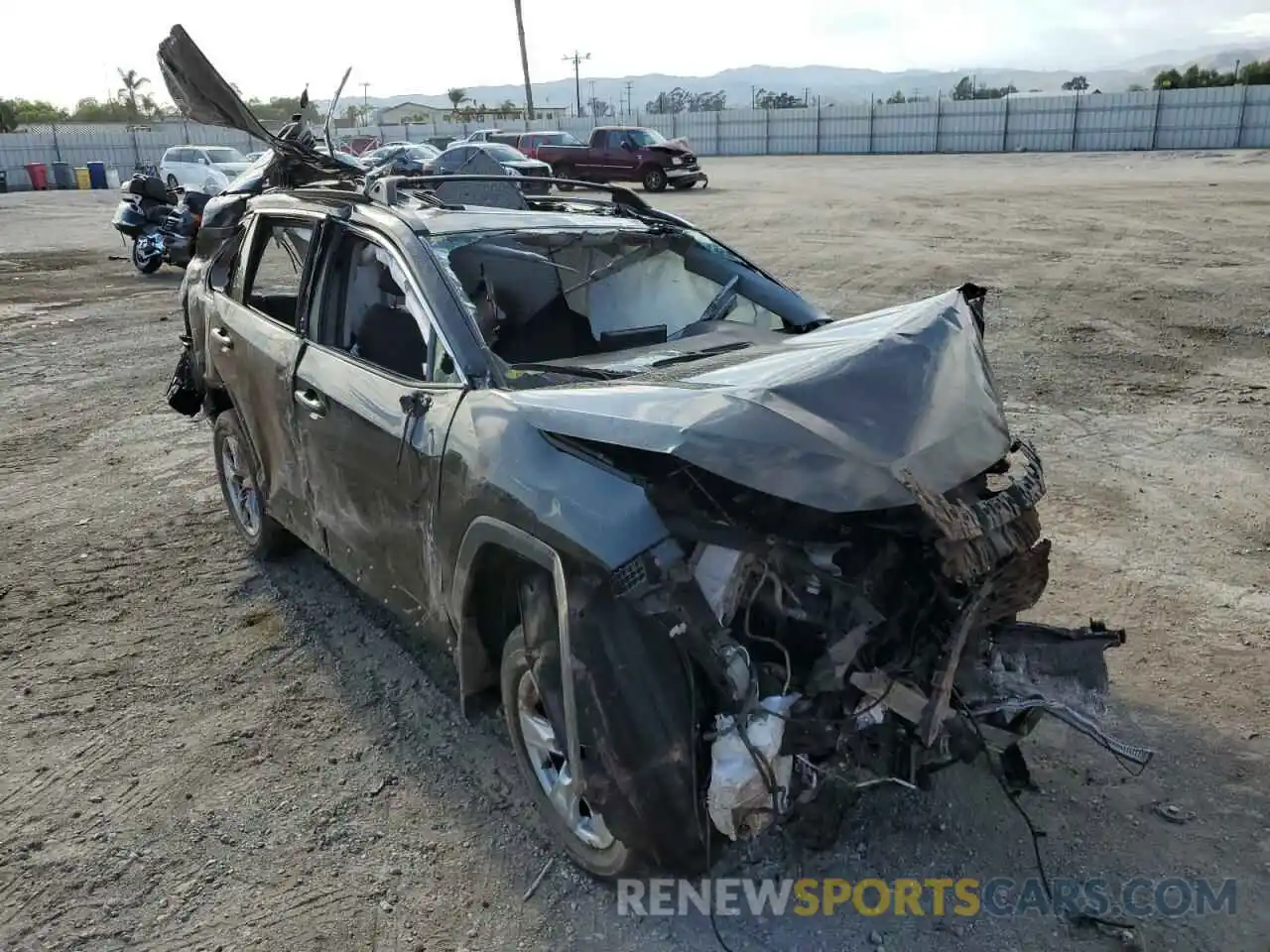 1 Photograph of a damaged car JTMW1RFVXKD029855 TOYOTA RAV4 2019