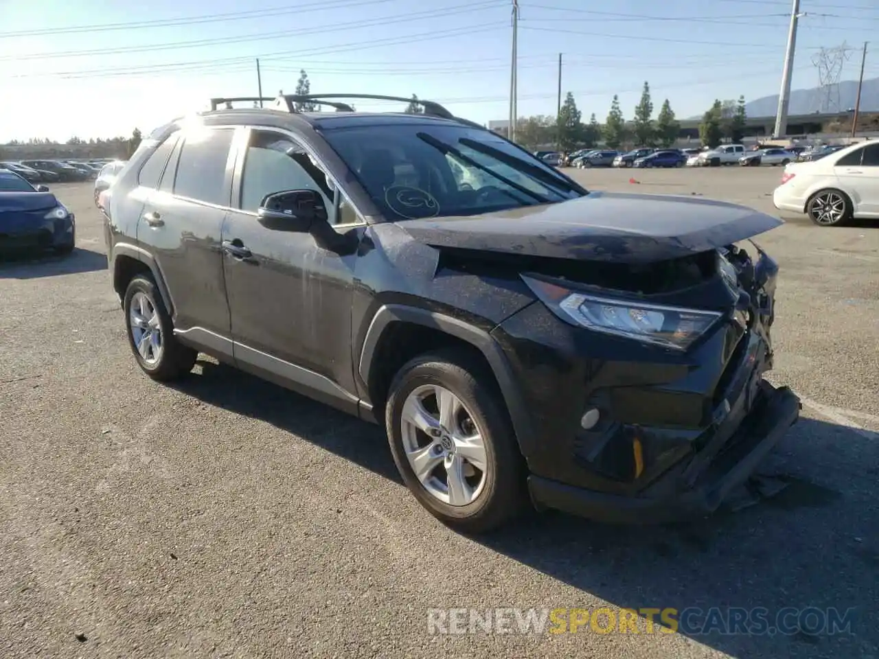 4 Photograph of a damaged car JTMW1RFVXKJ012023 TOYOTA RAV4 2019