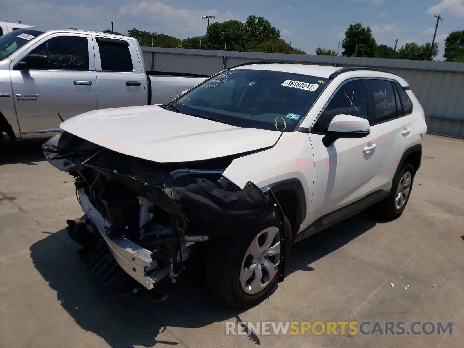 2 Photograph of a damaged car 2T3K1RFV9LW093615 TOYOTA RAV4 2020