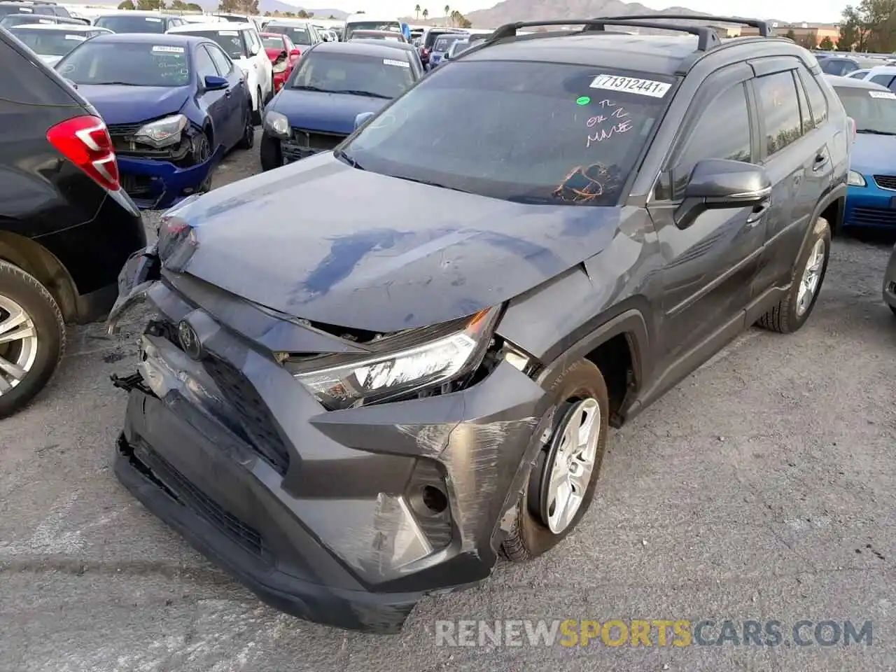 2 Photograph of a damaged car 2T3W1RFVXLC085090 TOYOTA RAV4 2020