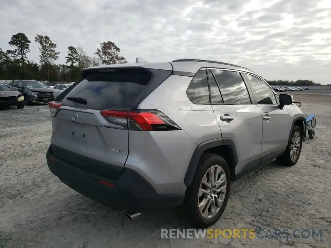 4 Photograph of a damaged car JTMC1RFV1MD079615 TOYOTA RAV4 2021