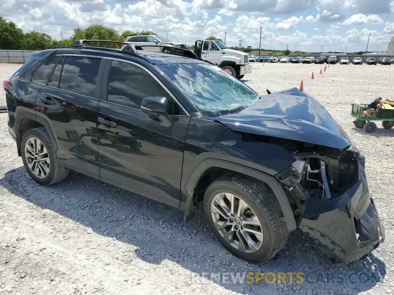 4 Photograph of a damaged car JTMC1RFV2MD064024 TOYOTA RAV4 2021
