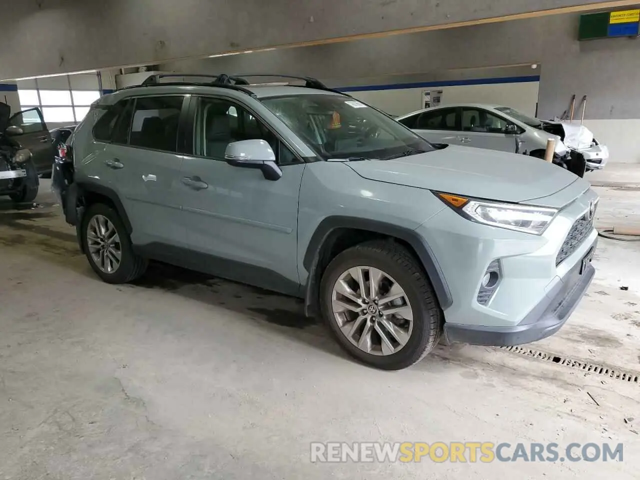 4 Photograph of a damaged car JTMC1RFV8MD074850 TOYOTA RAV4 2021