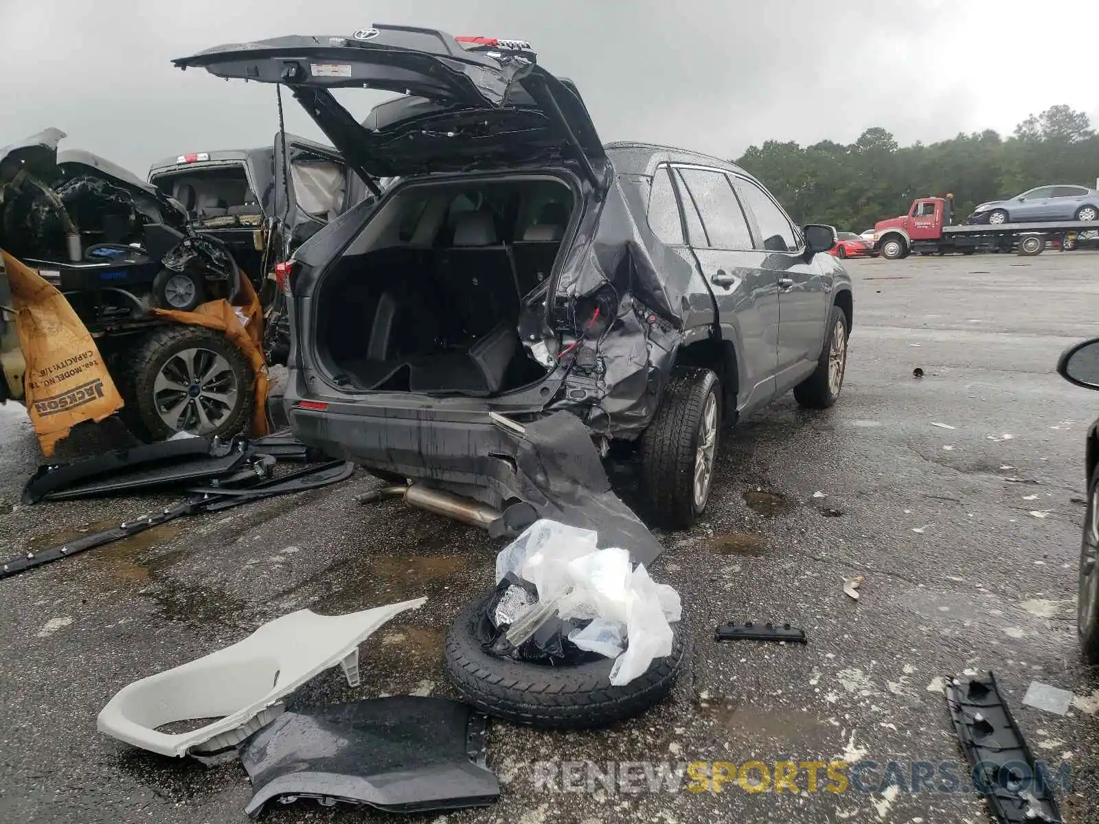 4 Photograph of a damaged car JTMC1RFVXMD065132 TOYOTA RAV4 2021