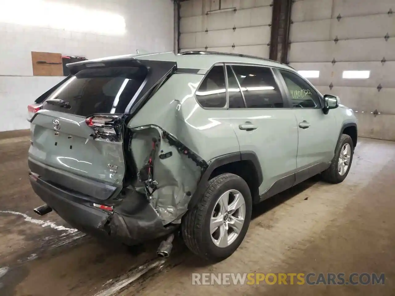 4 Photograph of a damaged car JTMP1RFV8MD075692 TOYOTA RAV4 2021