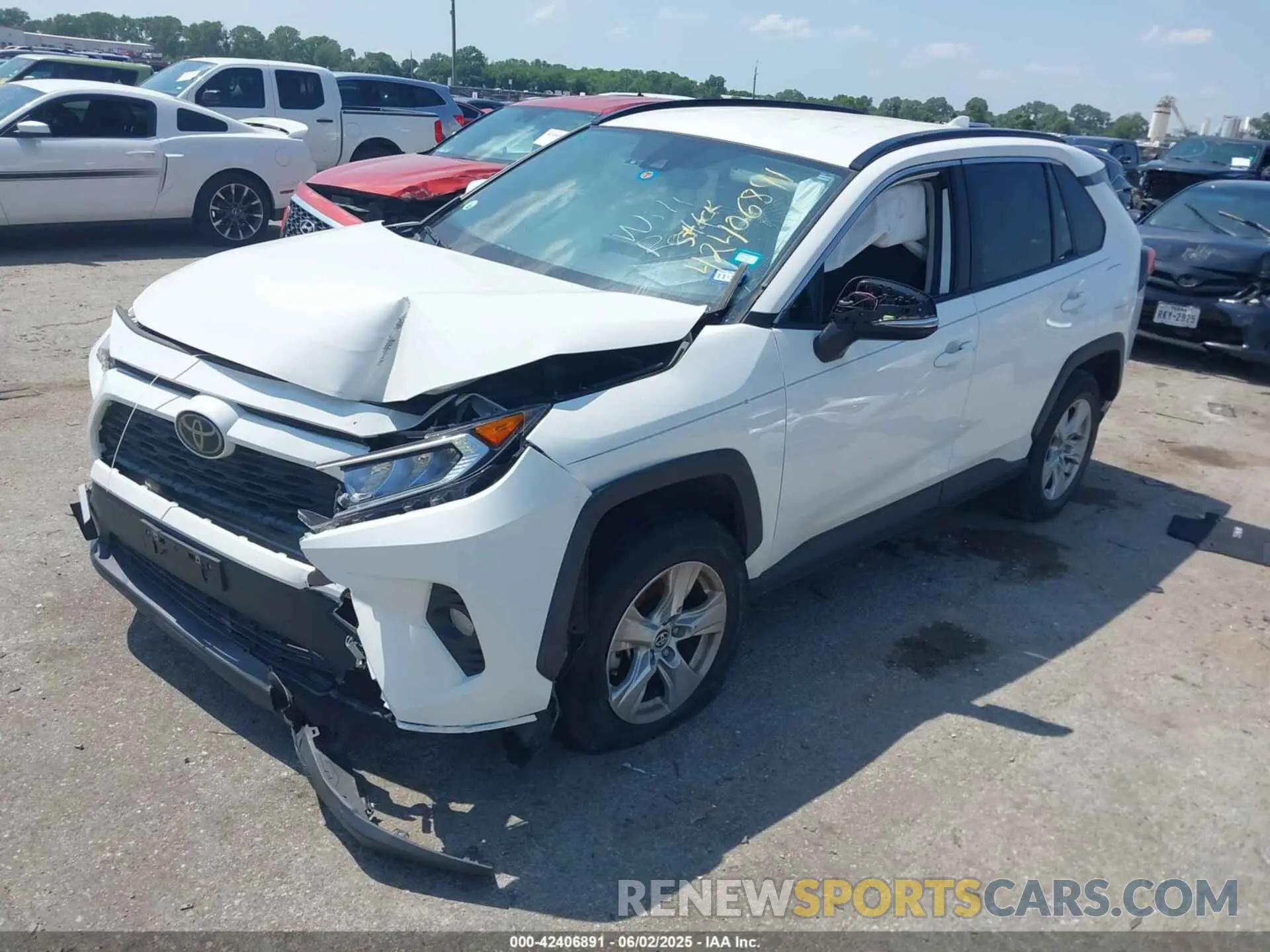 2 Photograph of a damaged car JTMW1RFV2MD063839 TOYOTA RAV4 2021