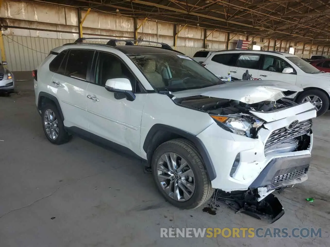 4 Photograph of a damaged car JTMY1RFVXMD062690 TOYOTA RAV4 2021