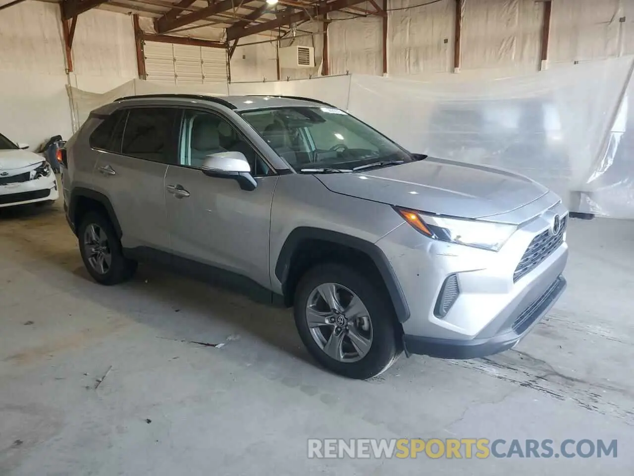 4 Photograph of a damaged car 2T3W1RFV0NW190660 TOYOTA RAV4 2022