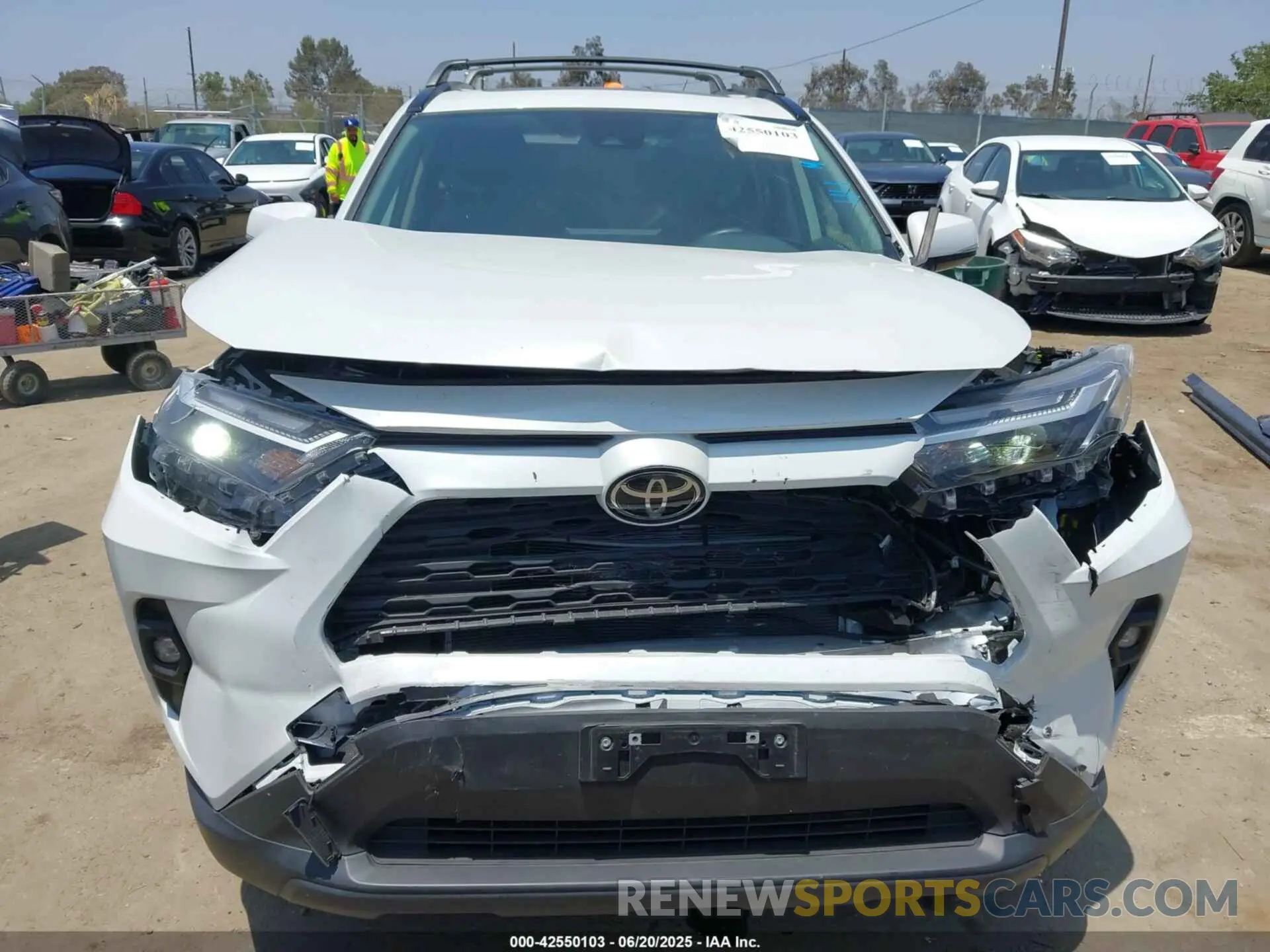 12 Photograph of a damaged car JTMC1RFV2PD101299 TOYOTA RAV4 2023