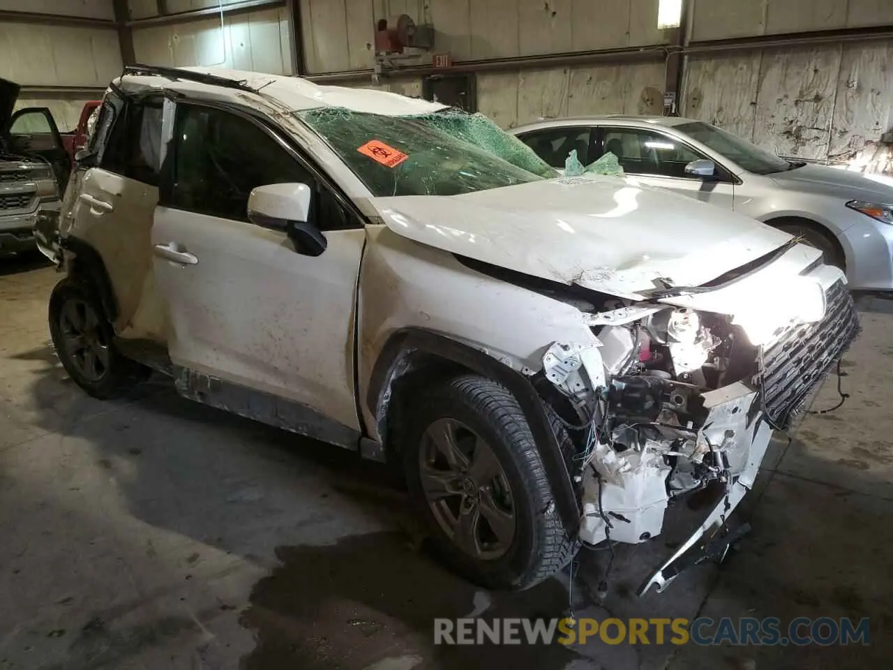 4 Photograph of a damaged car JTMMWRFV5PD198696 TOYOTA RAV4 2023