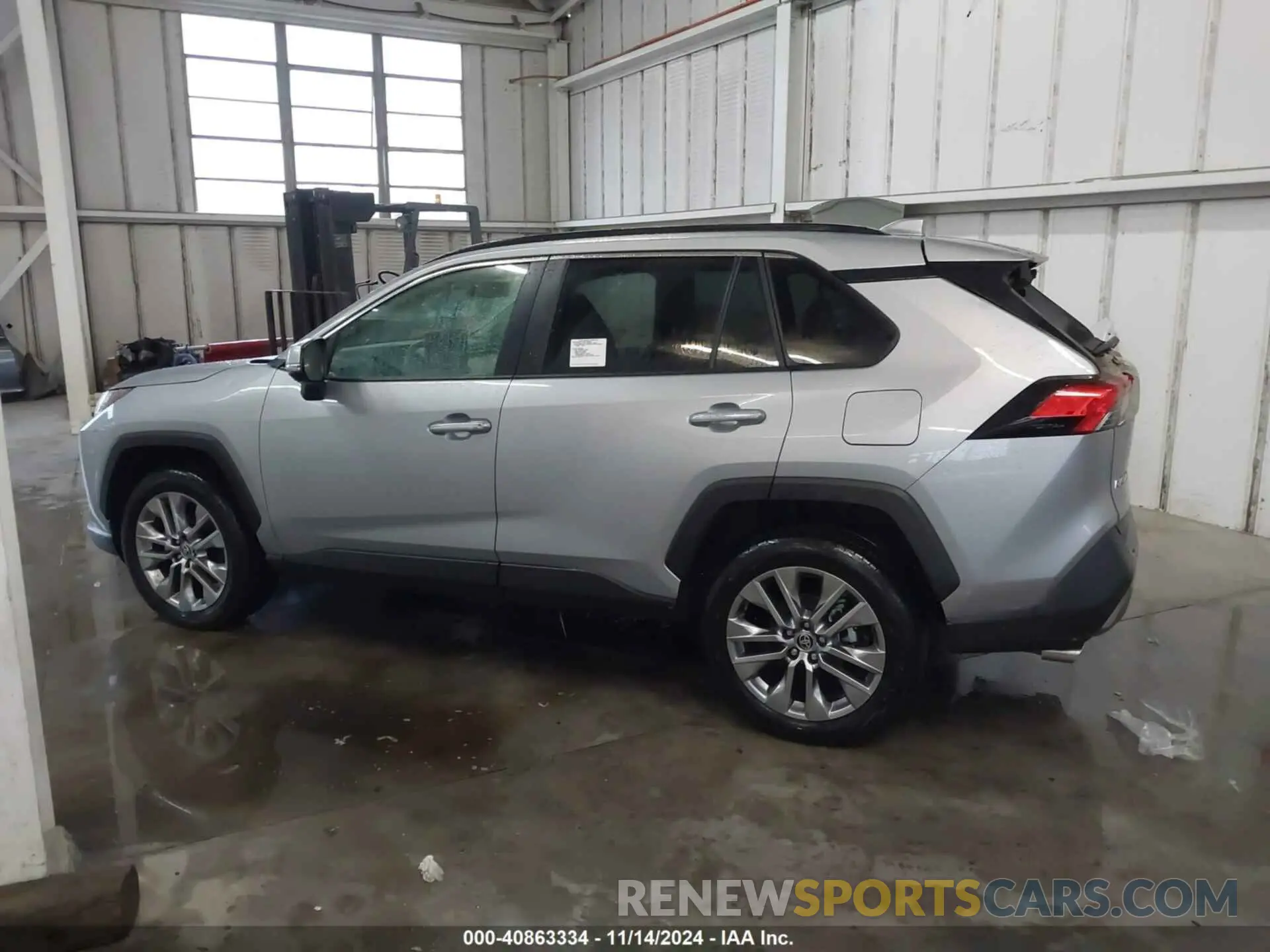 14 Photograph of a damaged car JTMN1RFV2RD106370 TOYOTA RAV4 2024