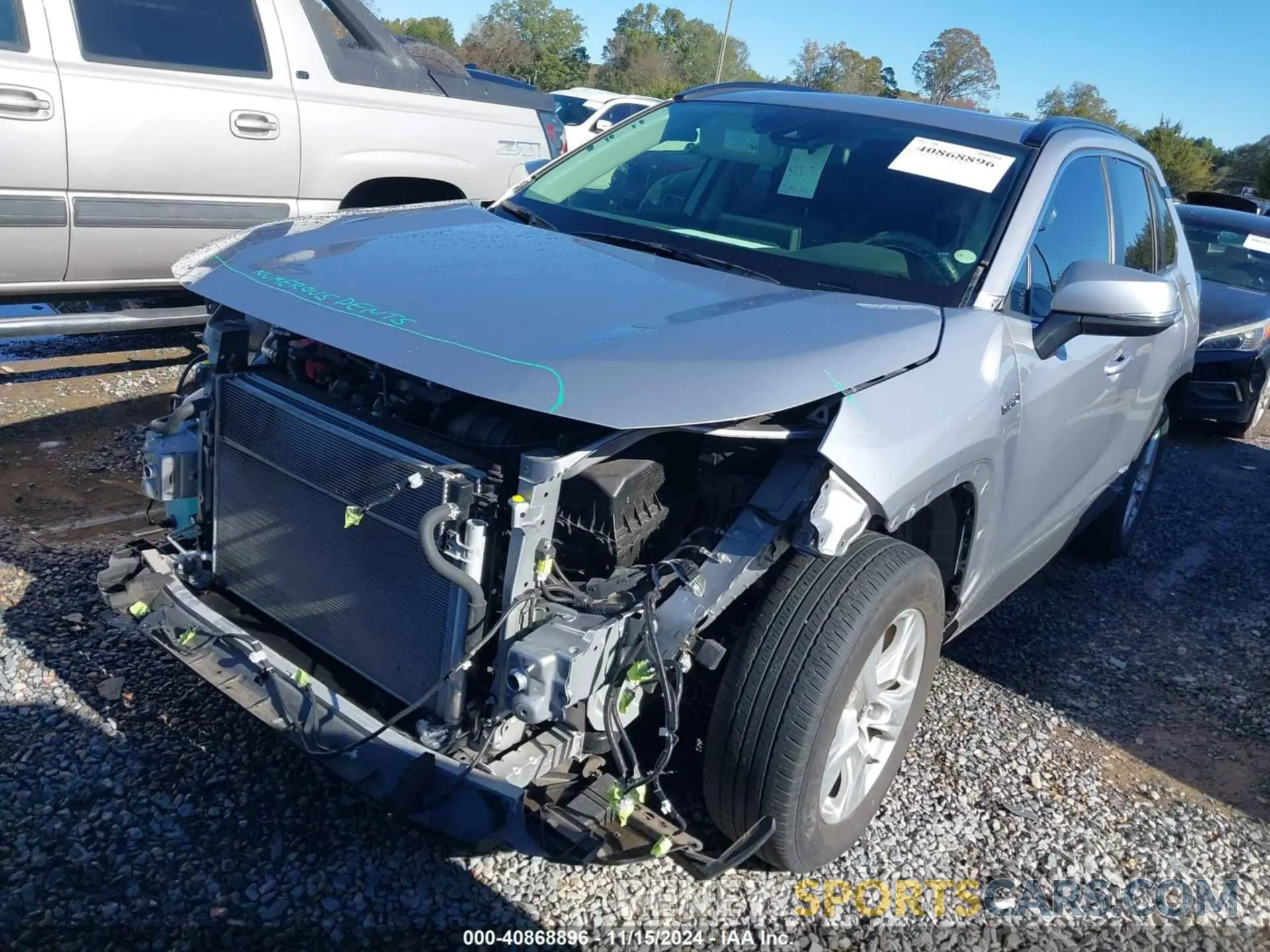 2 Photograph of a damaged car JTMRWRFV8KD034079 TOYOTA RAV4 HYBRID 2019