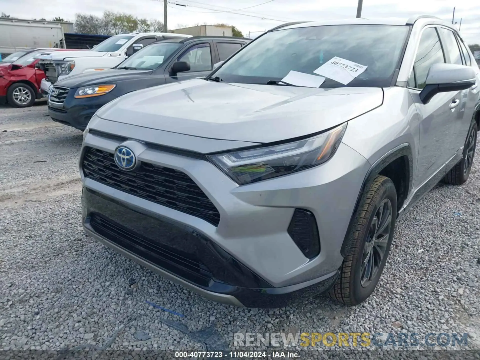 12 Photograph of a damaged car JTM16RFV0PD083927 TOYOTA RAV4 HYBRID 2023