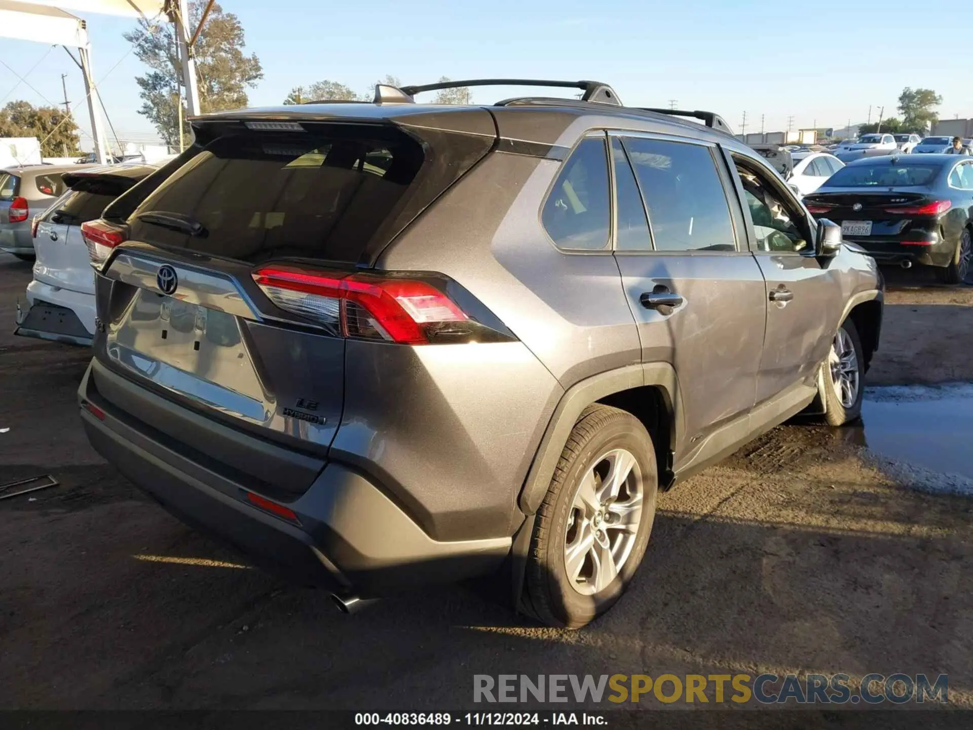 4 Photograph of a damaged car JTMMWRFV7RD216344 TOYOTA RAV4 HYBRID 2024