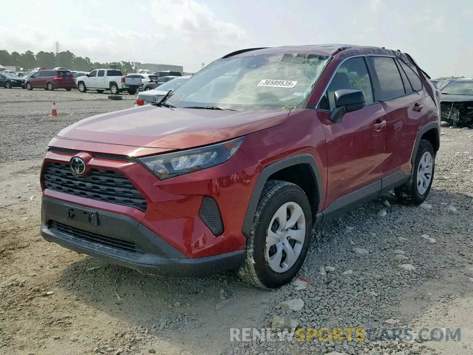 2 Photograph of a damaged car JTMH1RFV2KD502124 TOYOTA RAV4 LE 2019