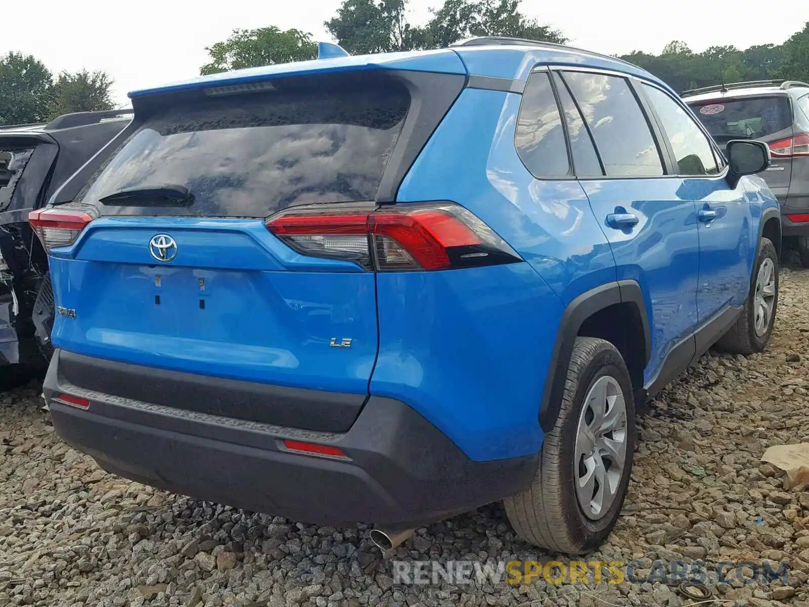 4 Photograph of a damaged car JTMH1RFV8KD501267 TOYOTA RAV4 LE 2019