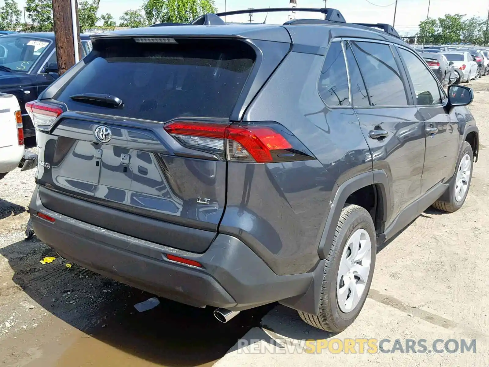 4 Photograph of a damaged car JTMH1RFV9KD505067 TOYOTA RAV4 LE 2019