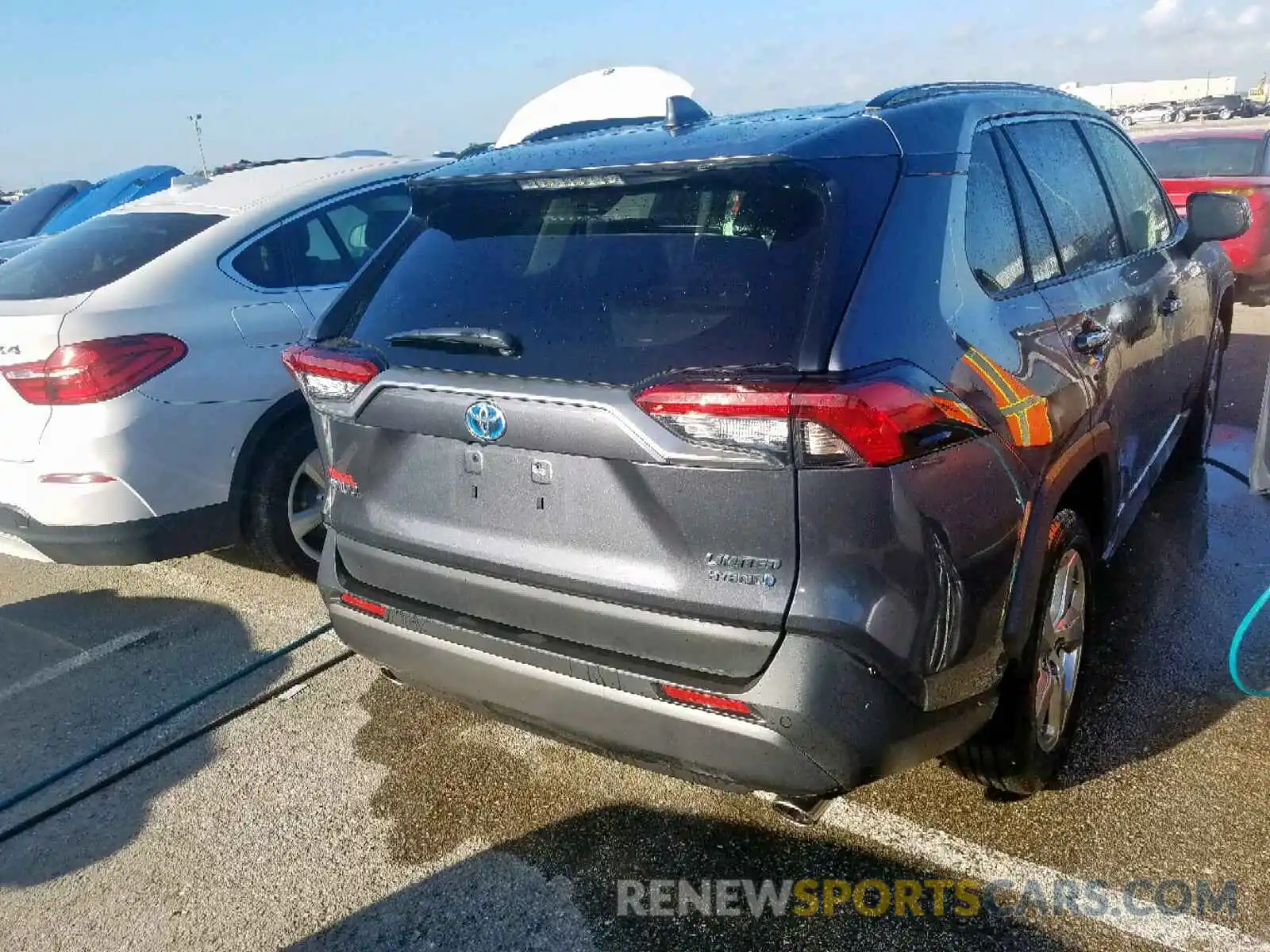 4 Photograph of a damaged car JTMDWRFV4KD505560 TOYOTA RAV4 LIMIT 2019