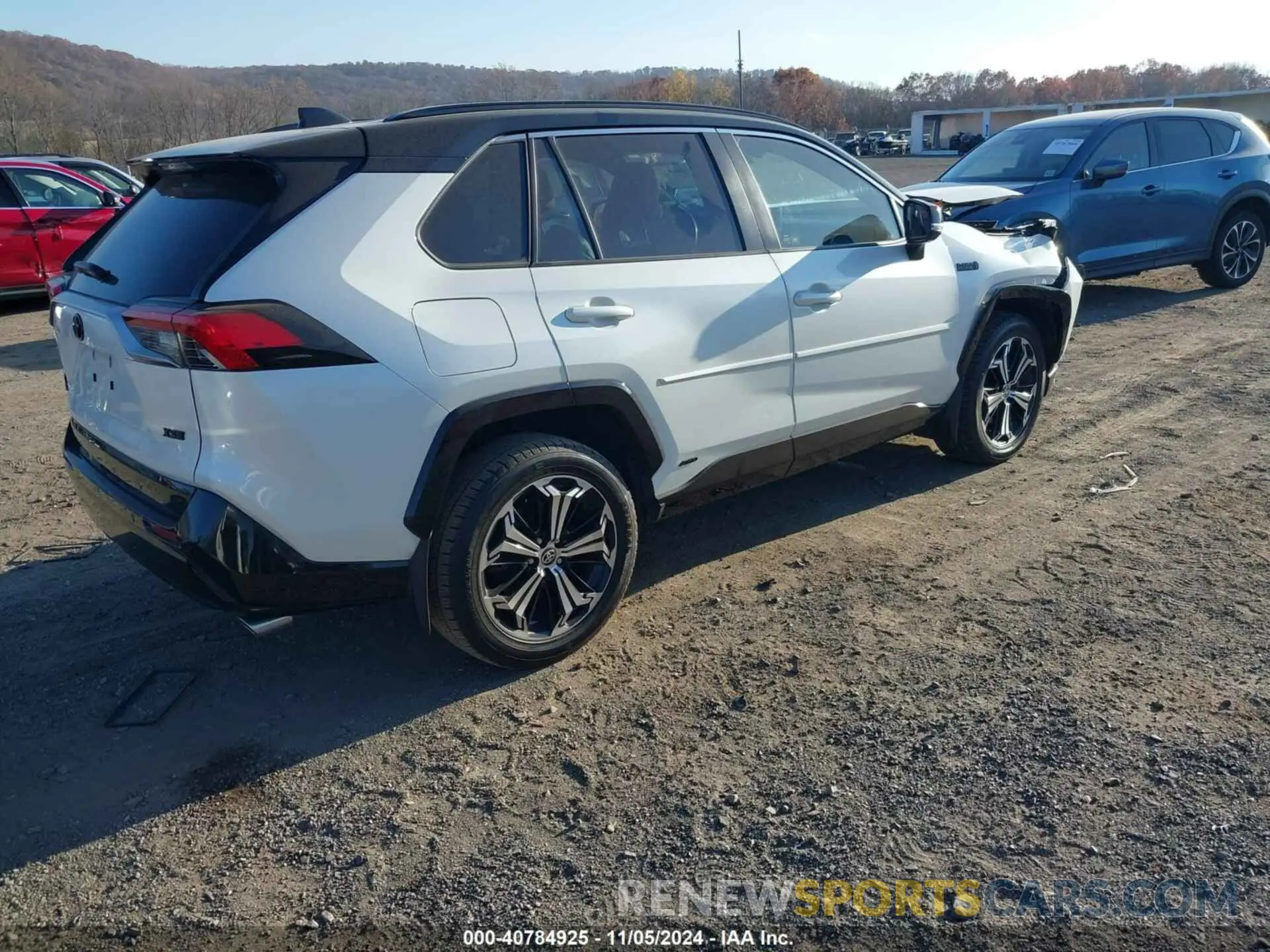 4 Photograph of a damaged car JTMFB3FV9MD053500 TOYOTA RAV4 PRIME 2021