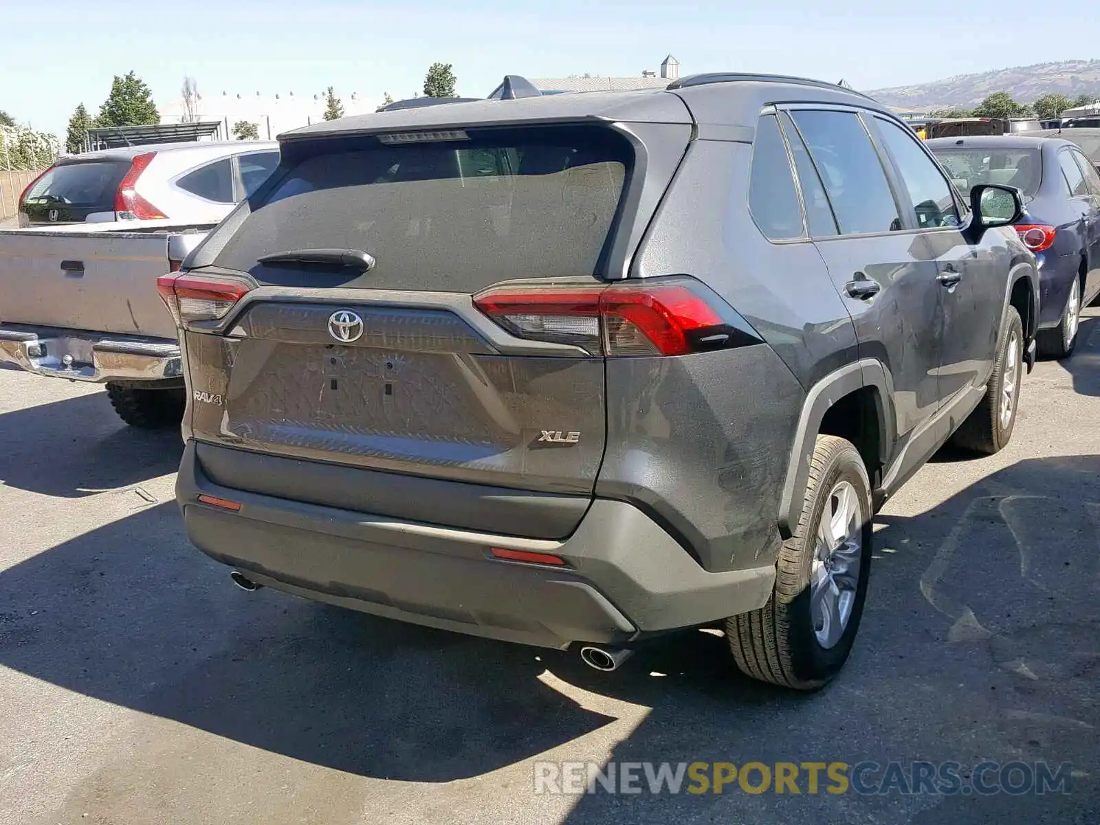 4 Photograph of a damaged car 2T3W1RFV2KC010298 TOYOTA RAV4 XLE 2019