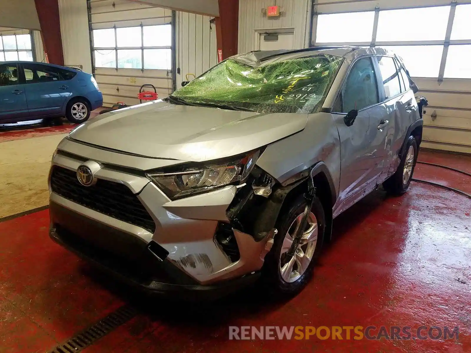 2 Photograph of a damaged car JTMP1RFV8KD047002 TOYOTA RAV4 XLE 2019