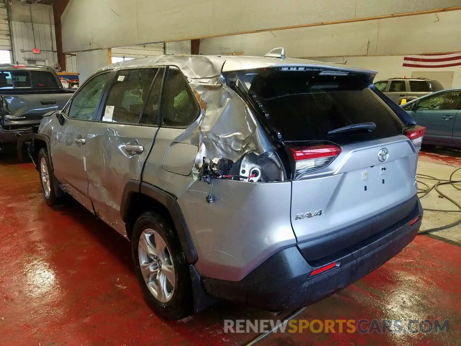 3 Photograph of a damaged car JTMP1RFV8KD047002 TOYOTA RAV4 XLE 2019