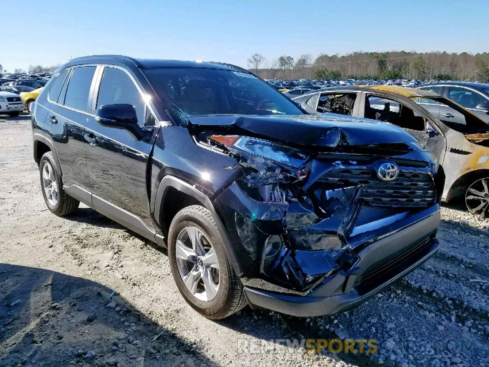 1 Photograph of a damaged car JTMW1RFV0KD016967 TOYOTA RAV4 XLE 2019