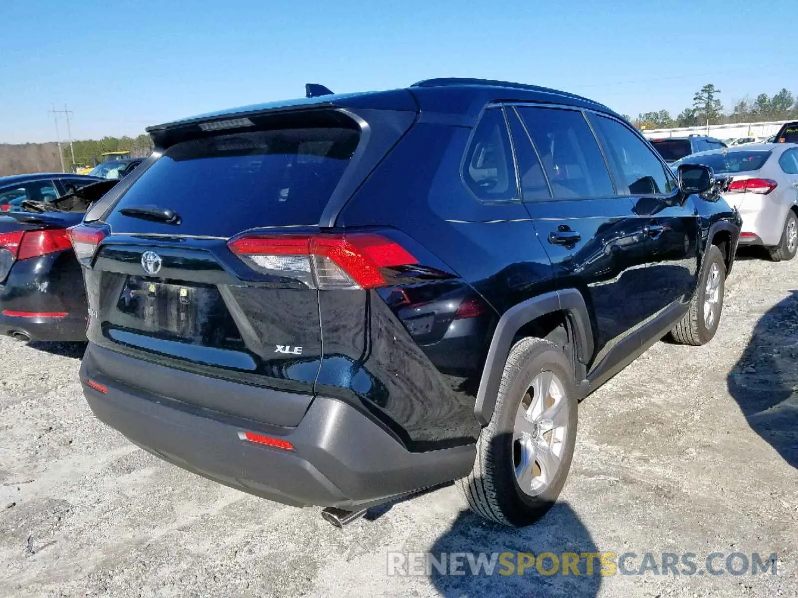 4 Photograph of a damaged car JTMW1RFV0KD016967 TOYOTA RAV4 XLE 2019