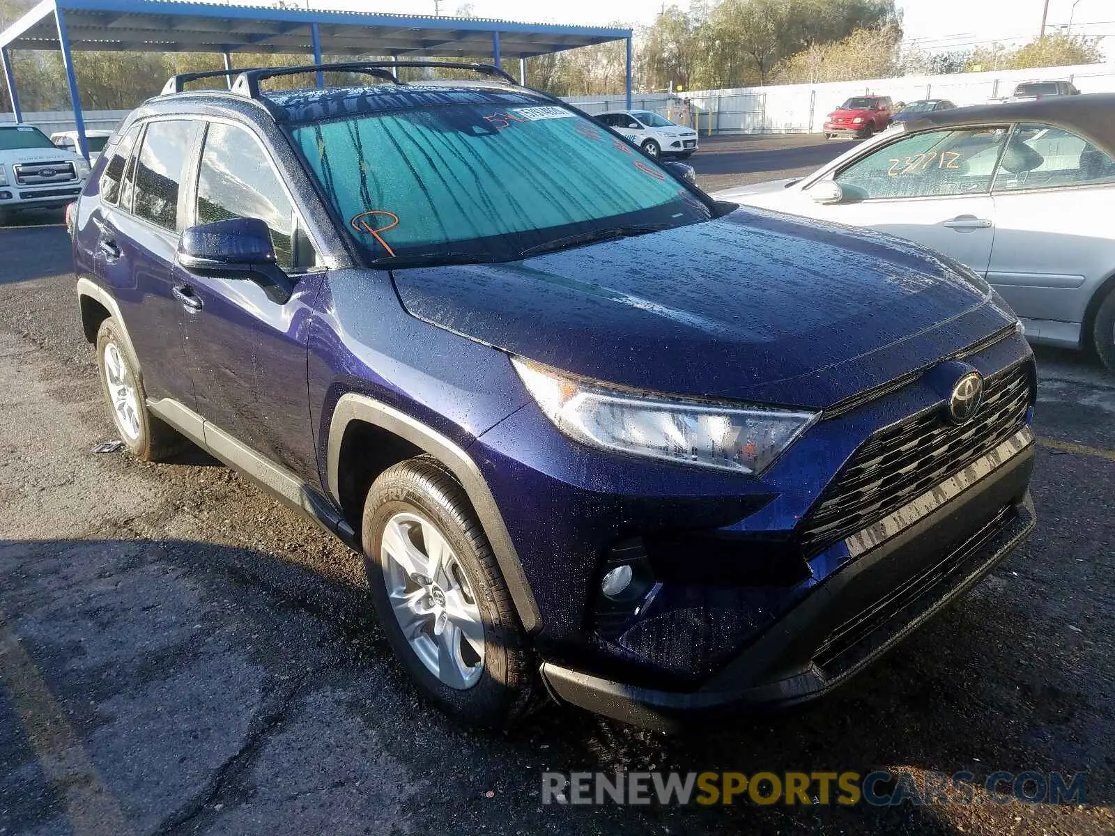 1 Photograph of a damaged car JTMW1RFV1KD022504 TOYOTA RAV4 XLE 2019