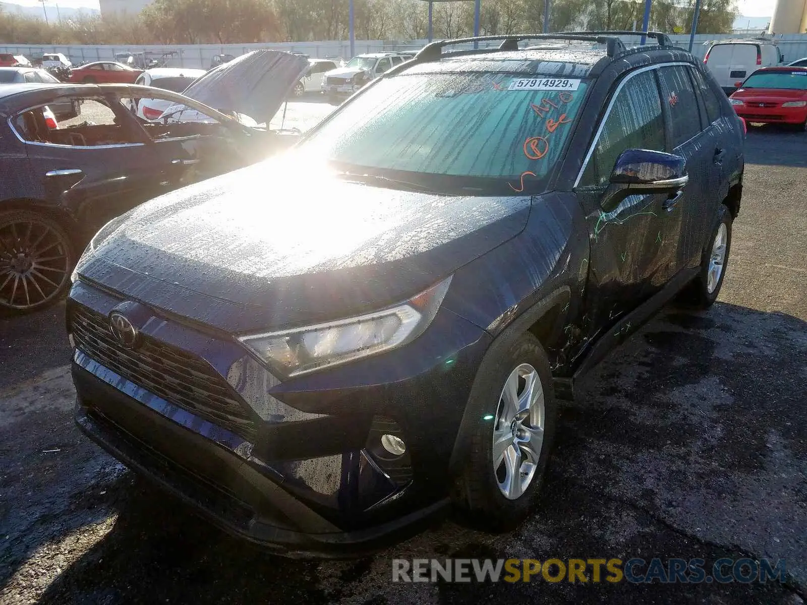 2 Photograph of a damaged car JTMW1RFV1KD022504 TOYOTA RAV4 XLE 2019