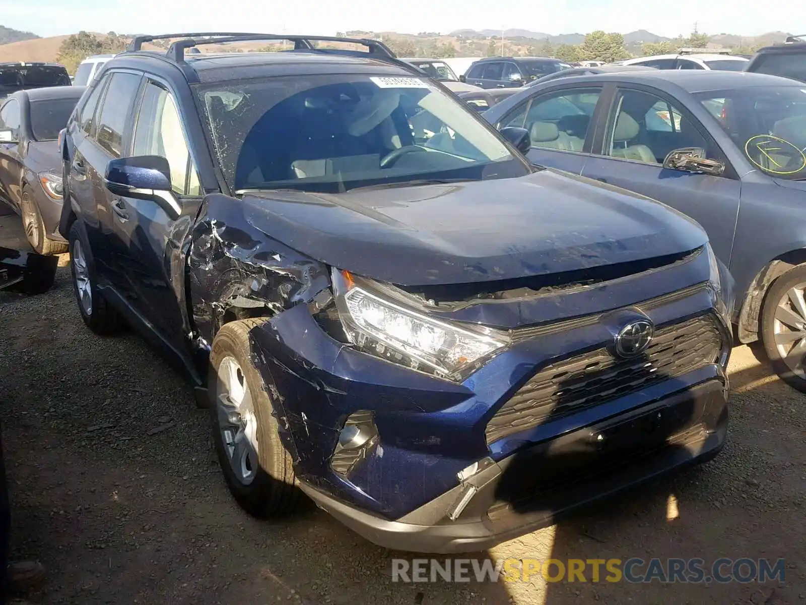 1 Photograph of a damaged car JTMW1RFV6KJ013735 TOYOTA RAV4 XLE 2019