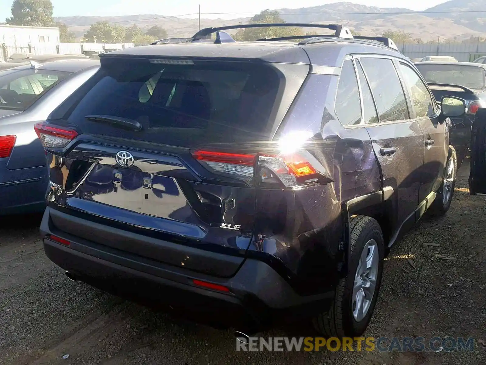 4 Photograph of a damaged car JTMW1RFV6KJ013735 TOYOTA RAV4 XLE 2019