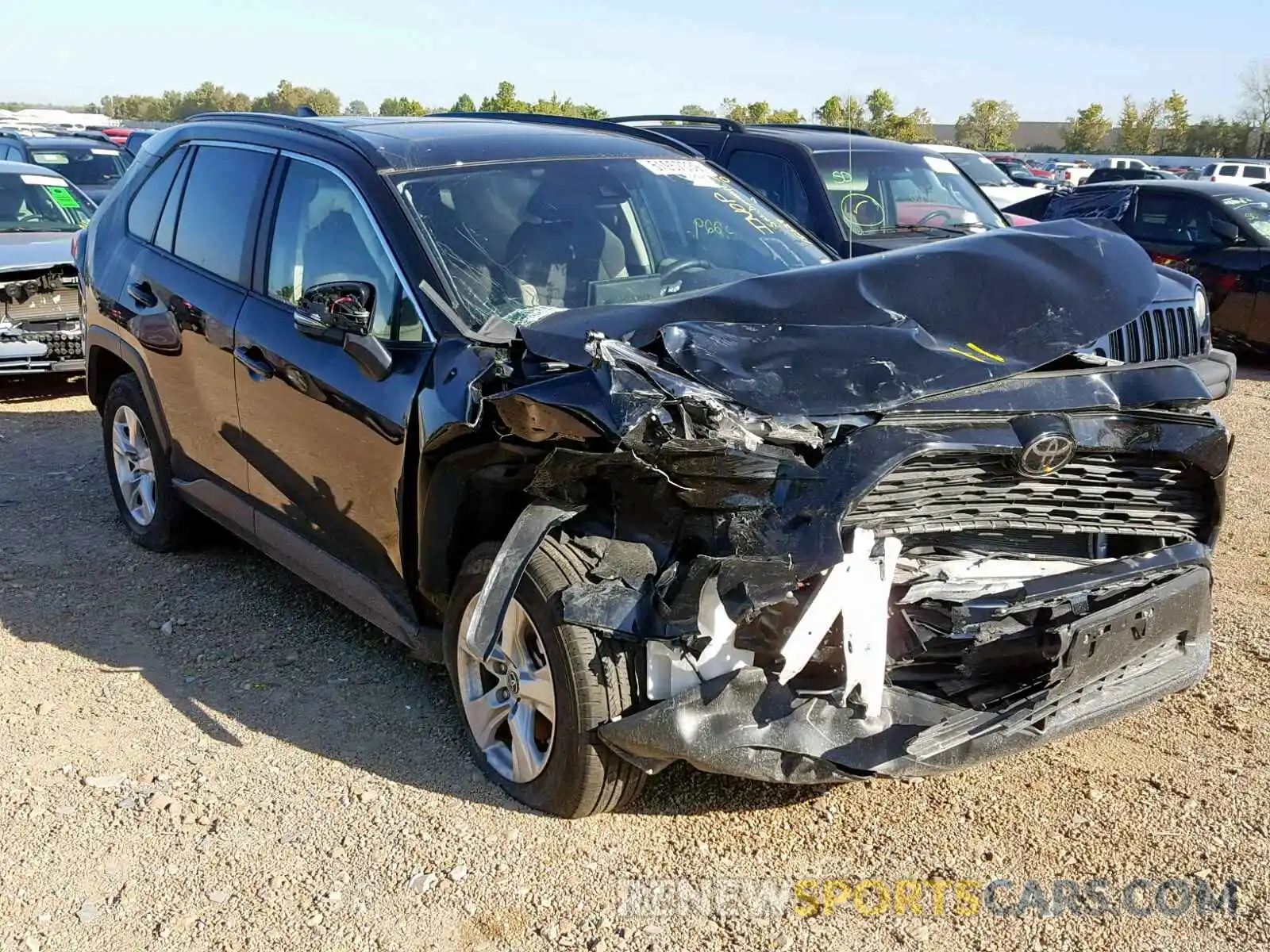 1 Photograph of a damaged car JTMW1RFV7KD004394 TOYOTA RAV4 XLE 2019