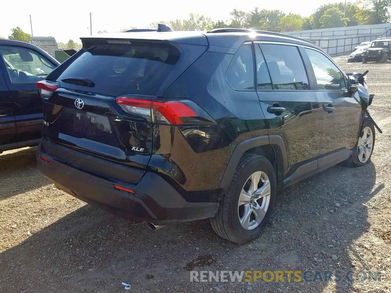 4 Photograph of a damaged car JTMW1RFV7KD004394 TOYOTA RAV4 XLE 2019