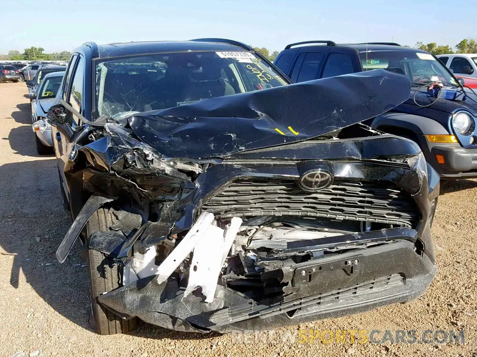 9 Photograph of a damaged car JTMW1RFV7KD004394 TOYOTA RAV4 XLE 2019