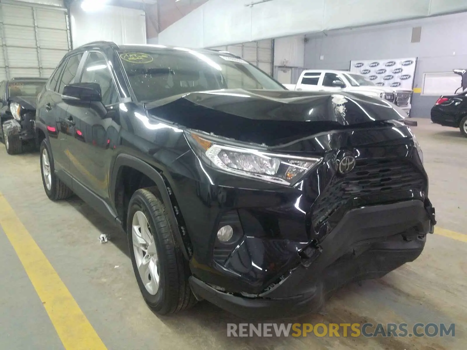 1 Photograph of a damaged car JTMW1RFV7KD506208 TOYOTA RAV4 XLE 2019