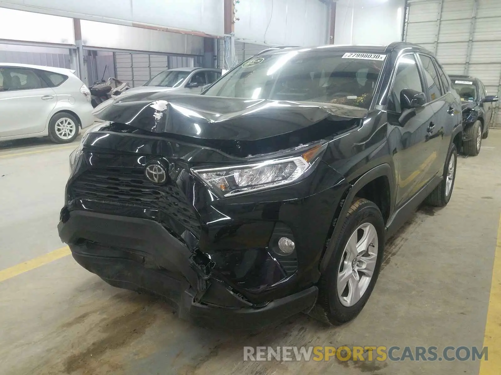 2 Photograph of a damaged car JTMW1RFV7KD506208 TOYOTA RAV4 XLE 2019