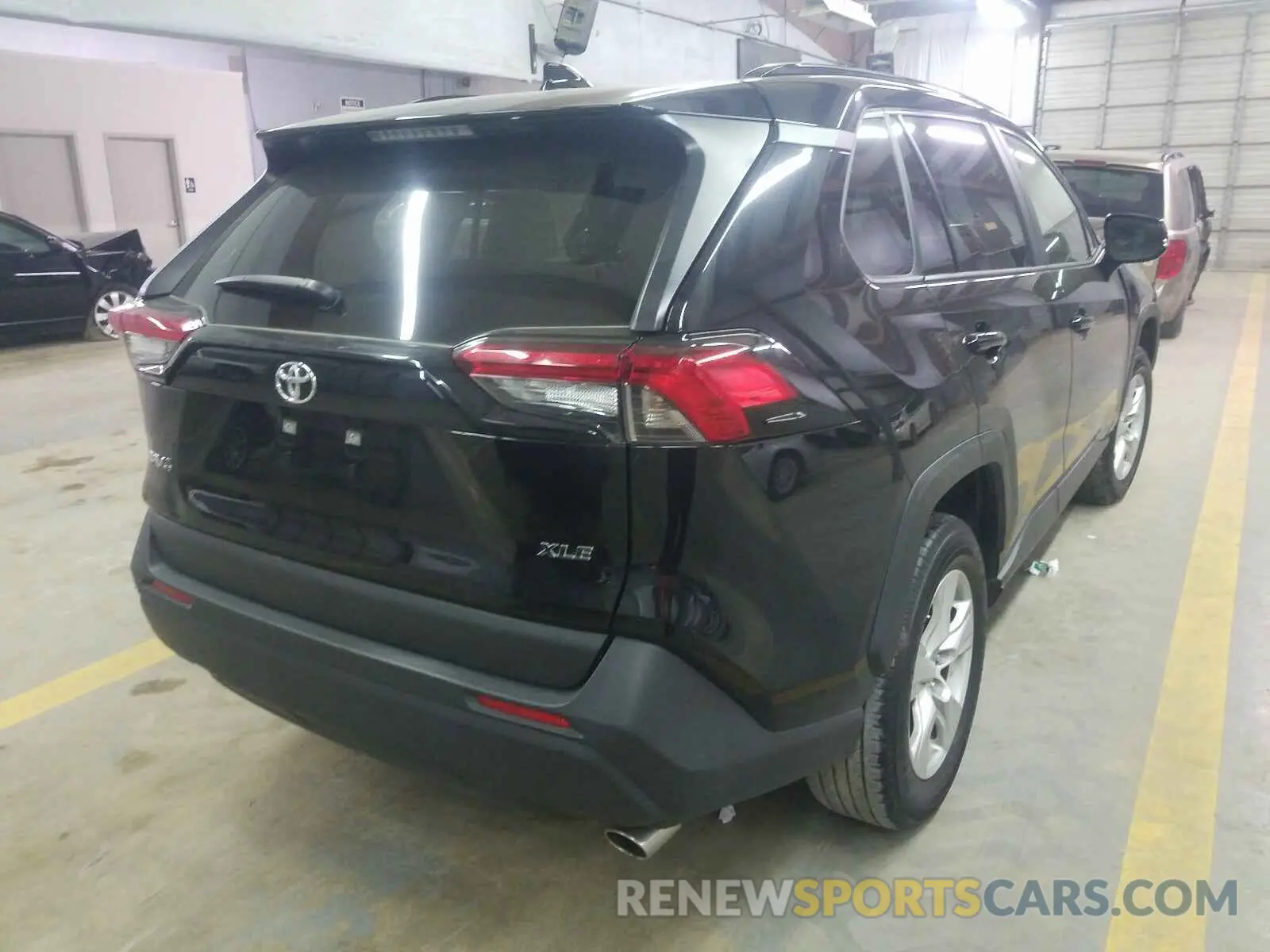 4 Photograph of a damaged car JTMW1RFV7KD506208 TOYOTA RAV4 XLE 2019