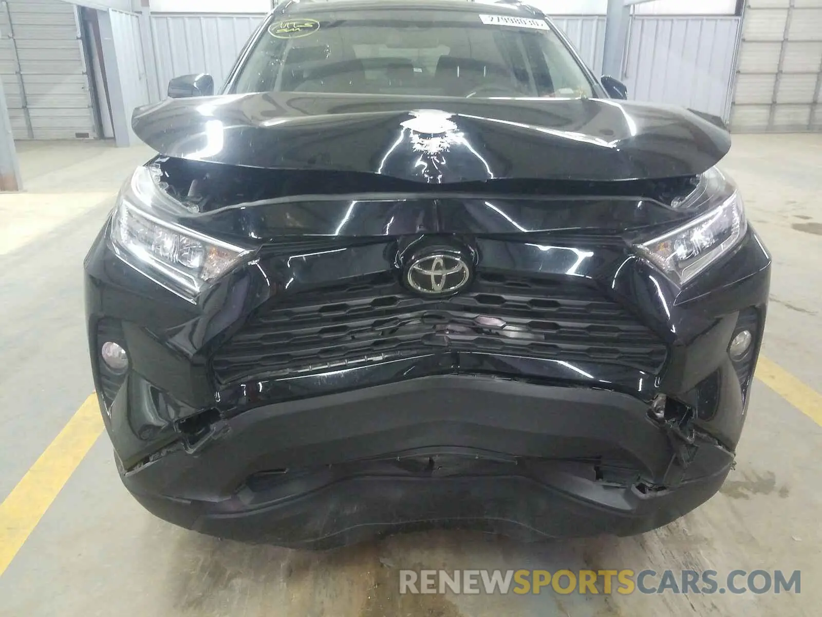 9 Photograph of a damaged car JTMW1RFV7KD506208 TOYOTA RAV4 XLE 2019