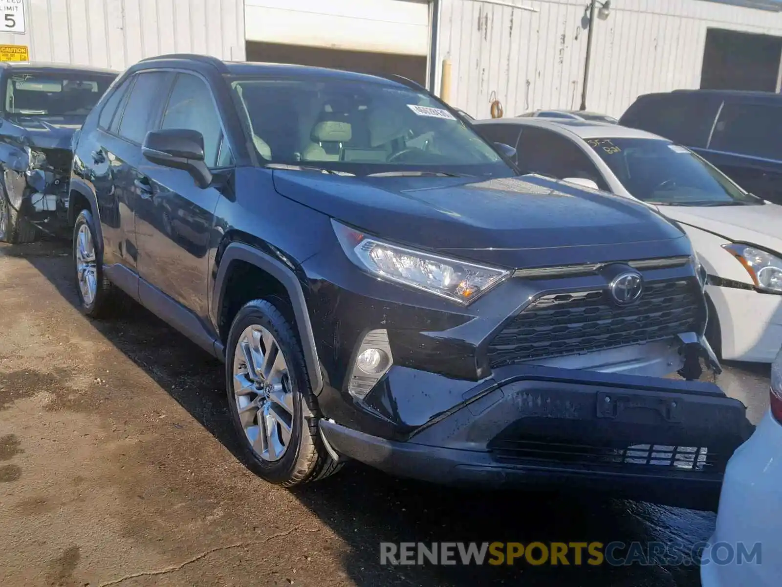 1 Photograph of a damaged car JTMA1RFV2KD015569 TOYOTA RAV4 XLE P 2019