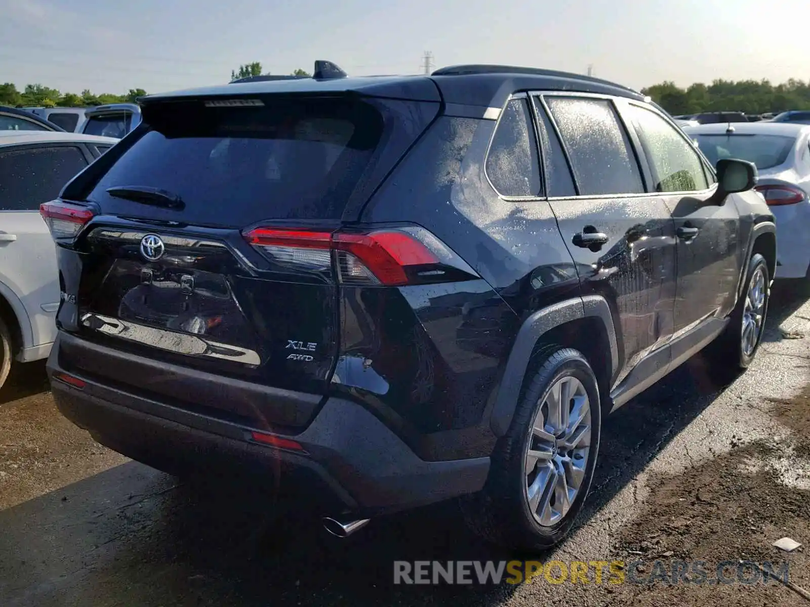 4 Photograph of a damaged car JTMA1RFV2KD015569 TOYOTA RAV4 XLE P 2019