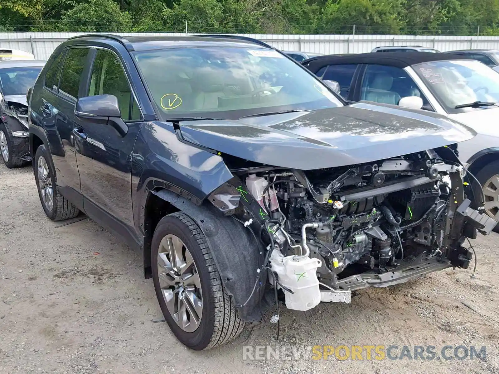 1 Photograph of a damaged car JTMA1RFV6KD517436 TOYOTA RAV4 XLE P 2019