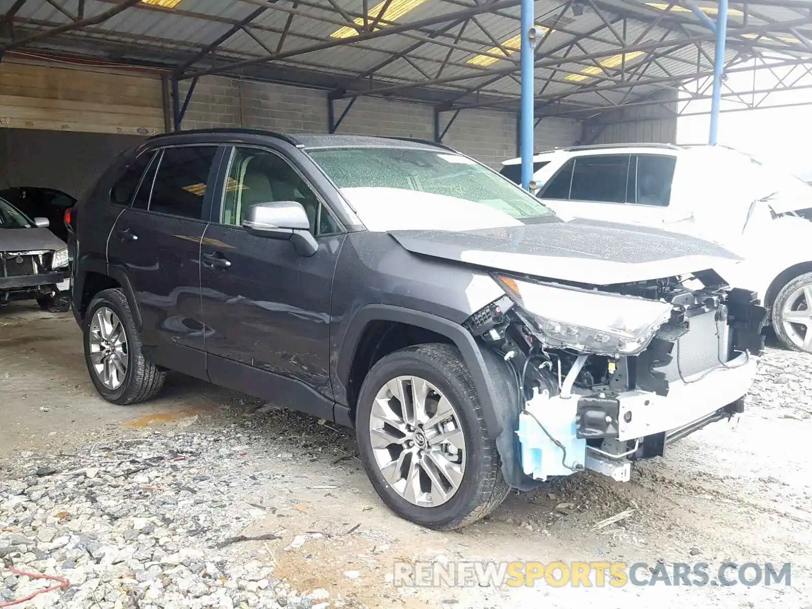 1 Photograph of a damaged car JTMA1RFV7KD011937 TOYOTA RAV4 XLE P 2019