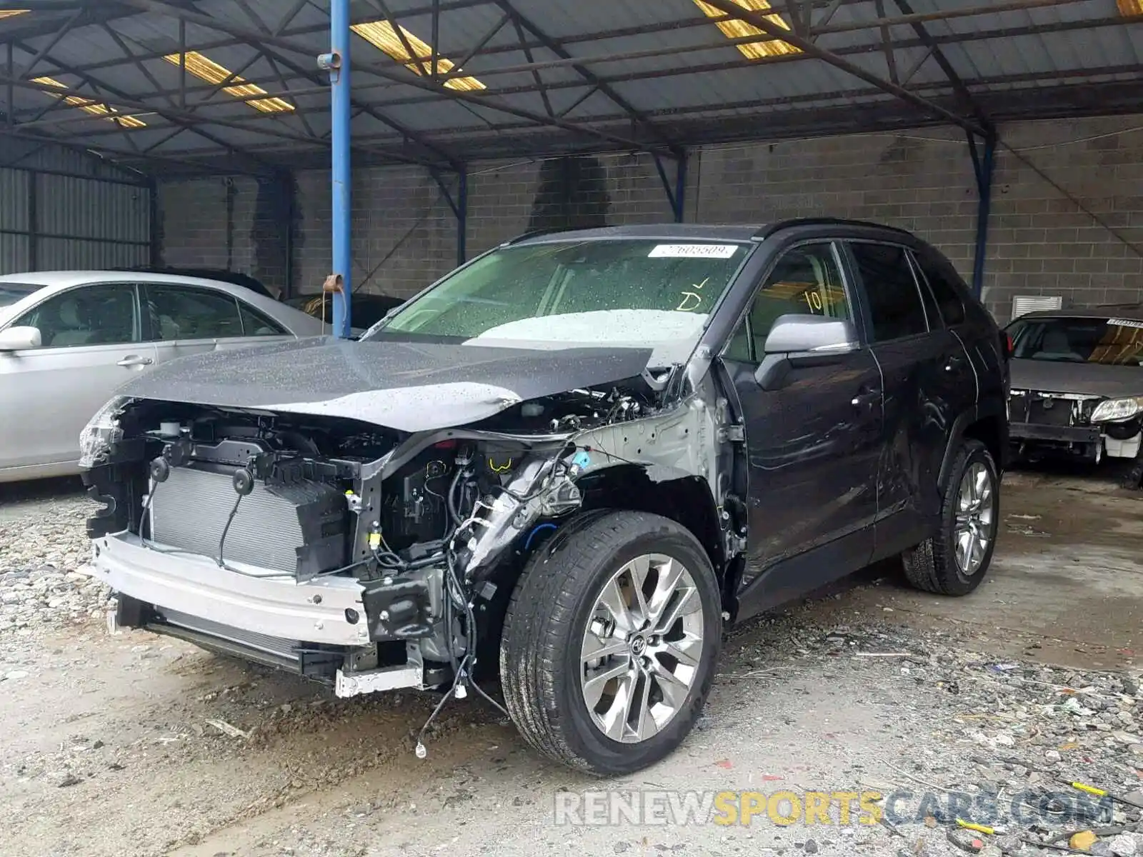 2 Photograph of a damaged car JTMA1RFV7KD011937 TOYOTA RAV4 XLE P 2019