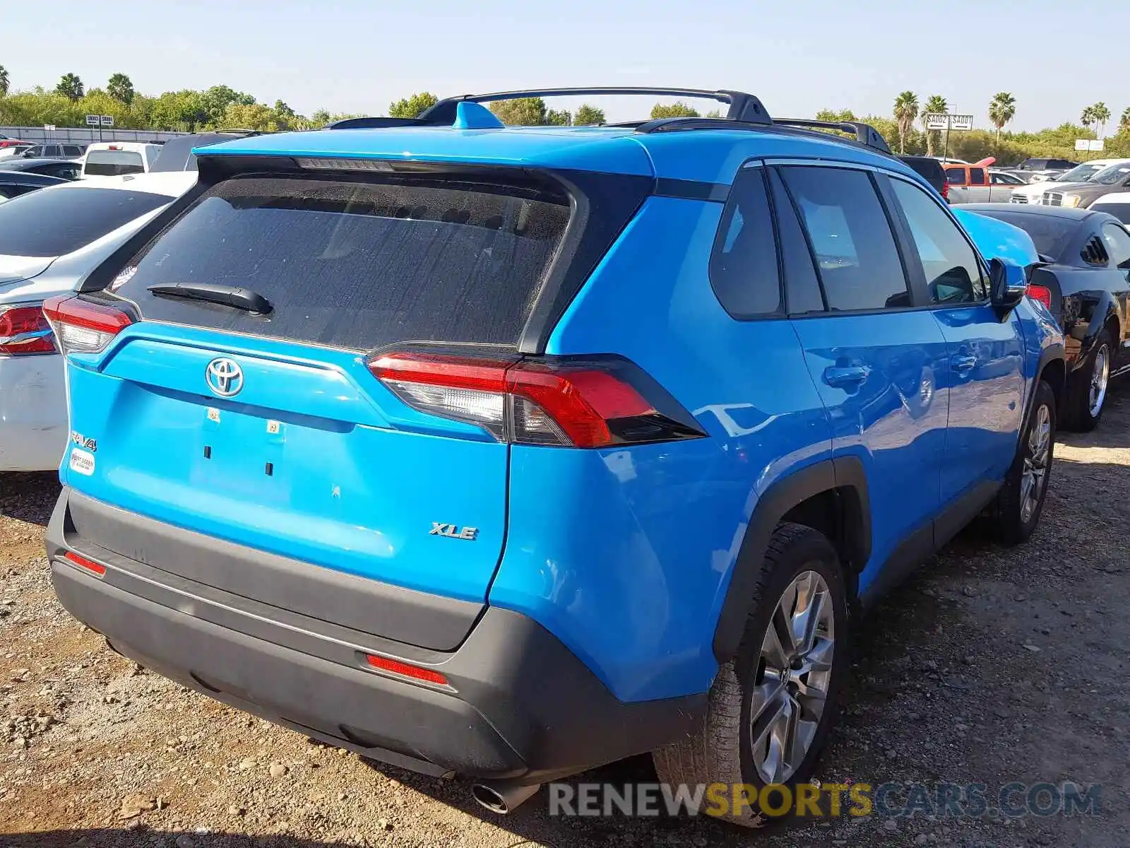 4 Photograph of a damaged car JTMC1RFV4KD013282 TOYOTA RAV4 XLE P 2019