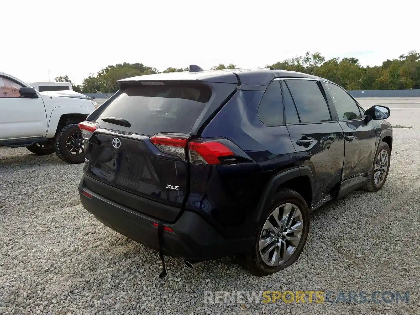 4 Photograph of a damaged car JTMC1RFV7KD006987 TOYOTA RAV4 XLE P 2019