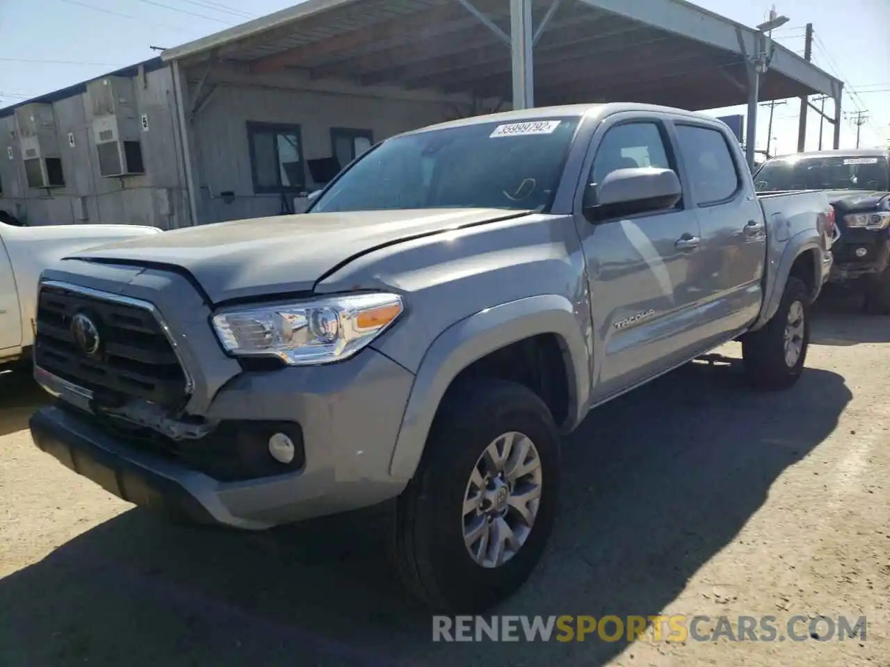 2 Photograph of a damaged car 3TMAZ5CN0KM088949 TOYOTA TACOMA 2019