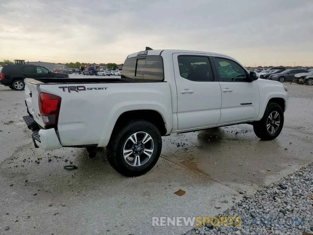 3 Photograph of a damaged car 3TMAZ5CN0KM095352 TOYOTA TACOMA 2019