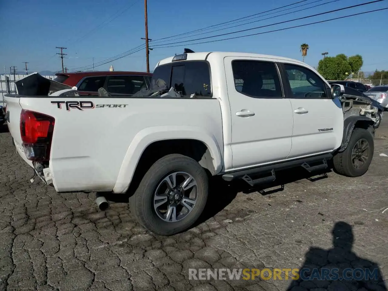 3 Photograph of a damaged car 3TMAZ5CN0KM100937 TOYOTA TACOMA 2019